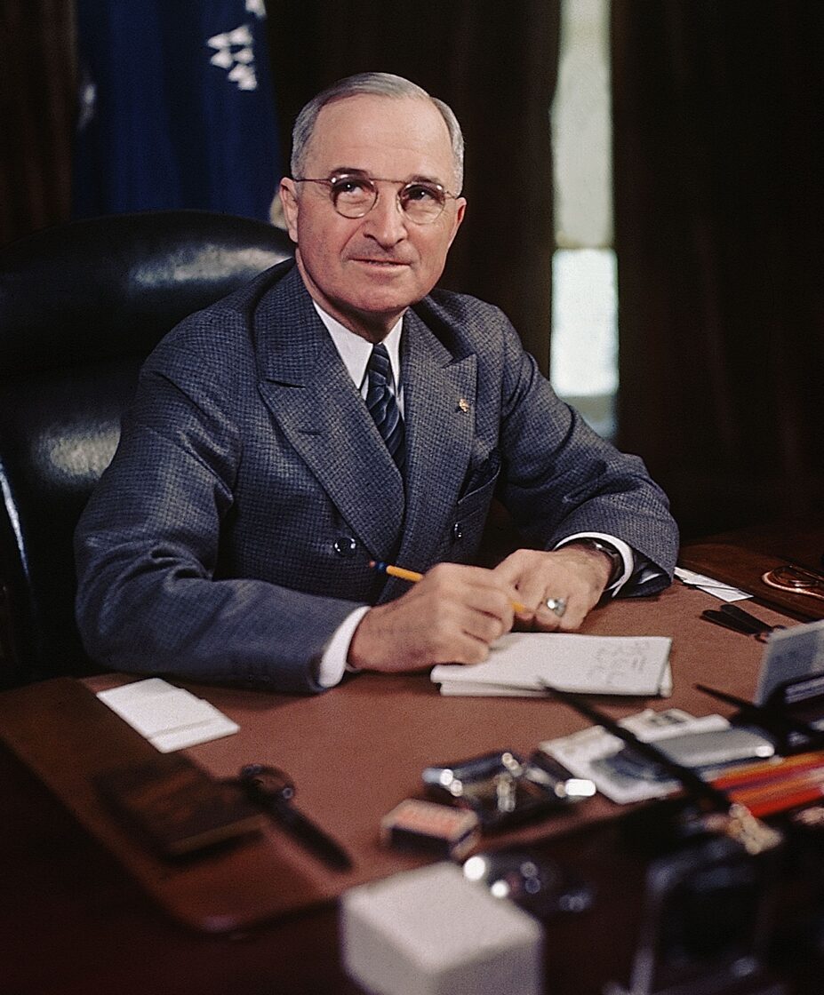 president-harry-s-truman-seated-at-his-desk-holding-a-pencil-getty.jpg